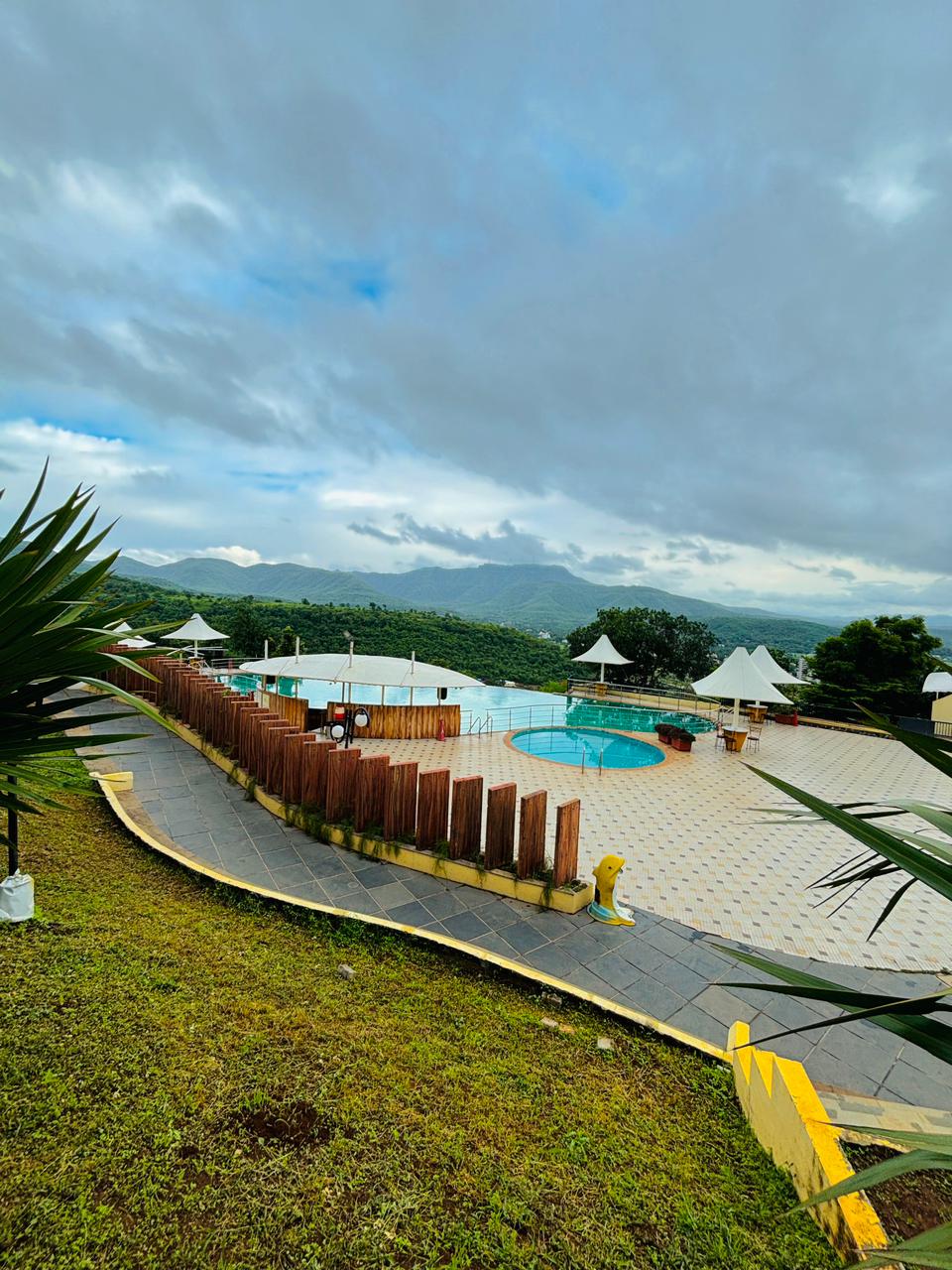 Dive into Serenity: Why Our Infinity Pool is the Ultimate Monsoon Escape